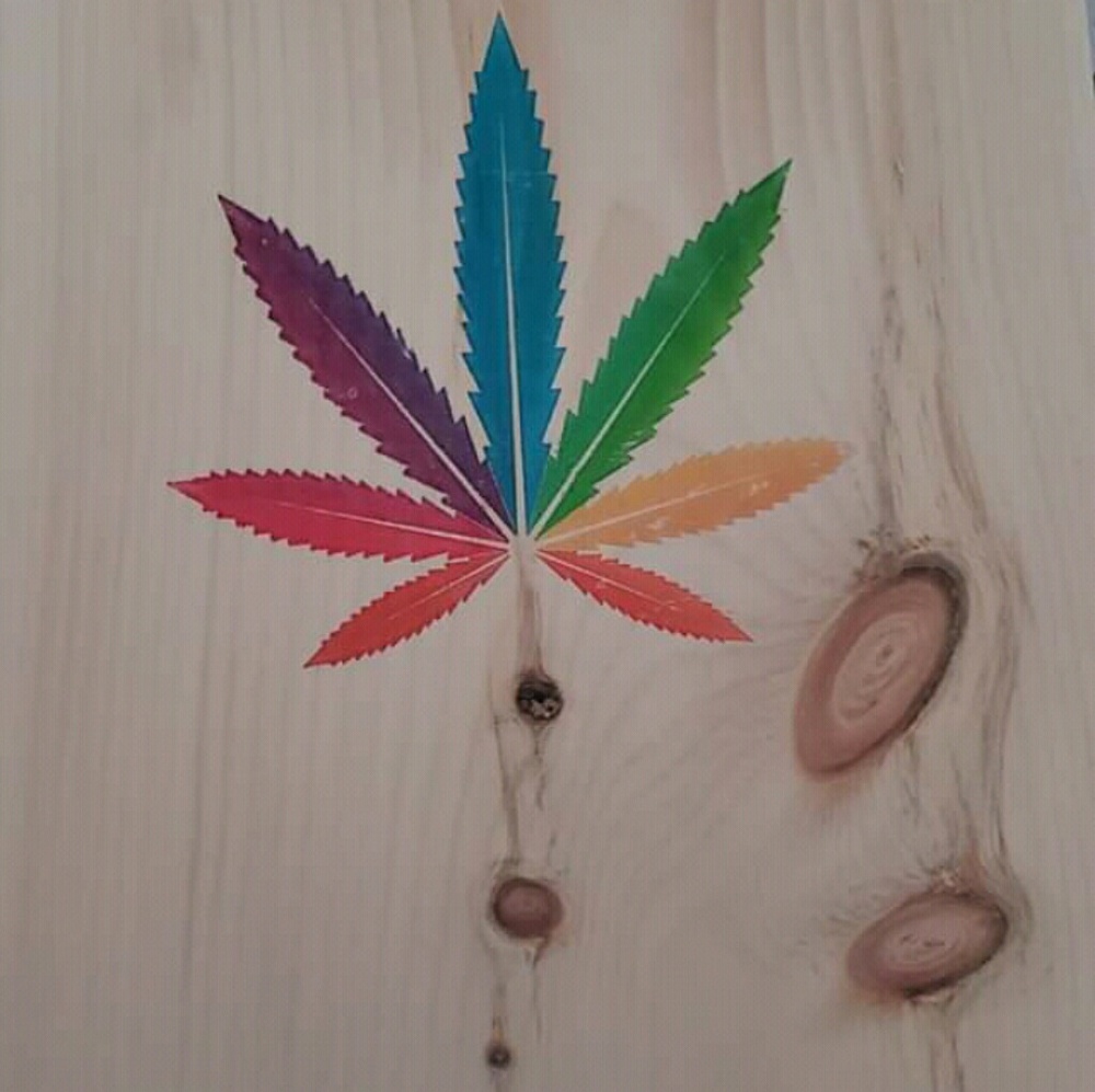 Gay pride pot leaf wall hanger.